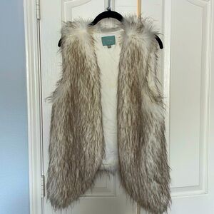 Skies are blue fur vest